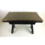 A Jack Grimble of Cromer oak coffee table, the adzed top over Gothic inspired supports,