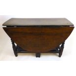 An 18th century gate leg table,