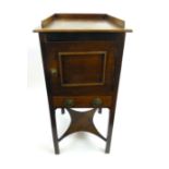 An early 19th century mahogany pot cupboard,