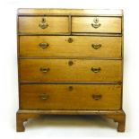 An 18th century oak caddy top chest of drawers,