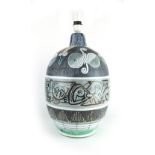 A Swedish pottery table lamp base decorated with stylised figures and incised bands by Ingmans