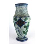 A Swedish pottery vase with floral decoration, h.