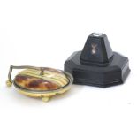 A 'Falco' automatic table lighter together with a faux tortoise shell and enamelled desk compact