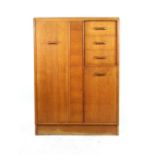 A 1960/70's G-Plan oak gentleman's wardrobe,