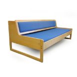 A Danish beech and blue upholstered day bed,