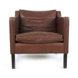 A Stouby brown leather armchair in the manner of Borge Mogensen CONDITION REPORT: