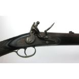 A 19th century Baker rifle style eighteen bore flintlock carbine rife, with brass fittings,