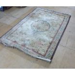 A hand woven Chinese silk rug,