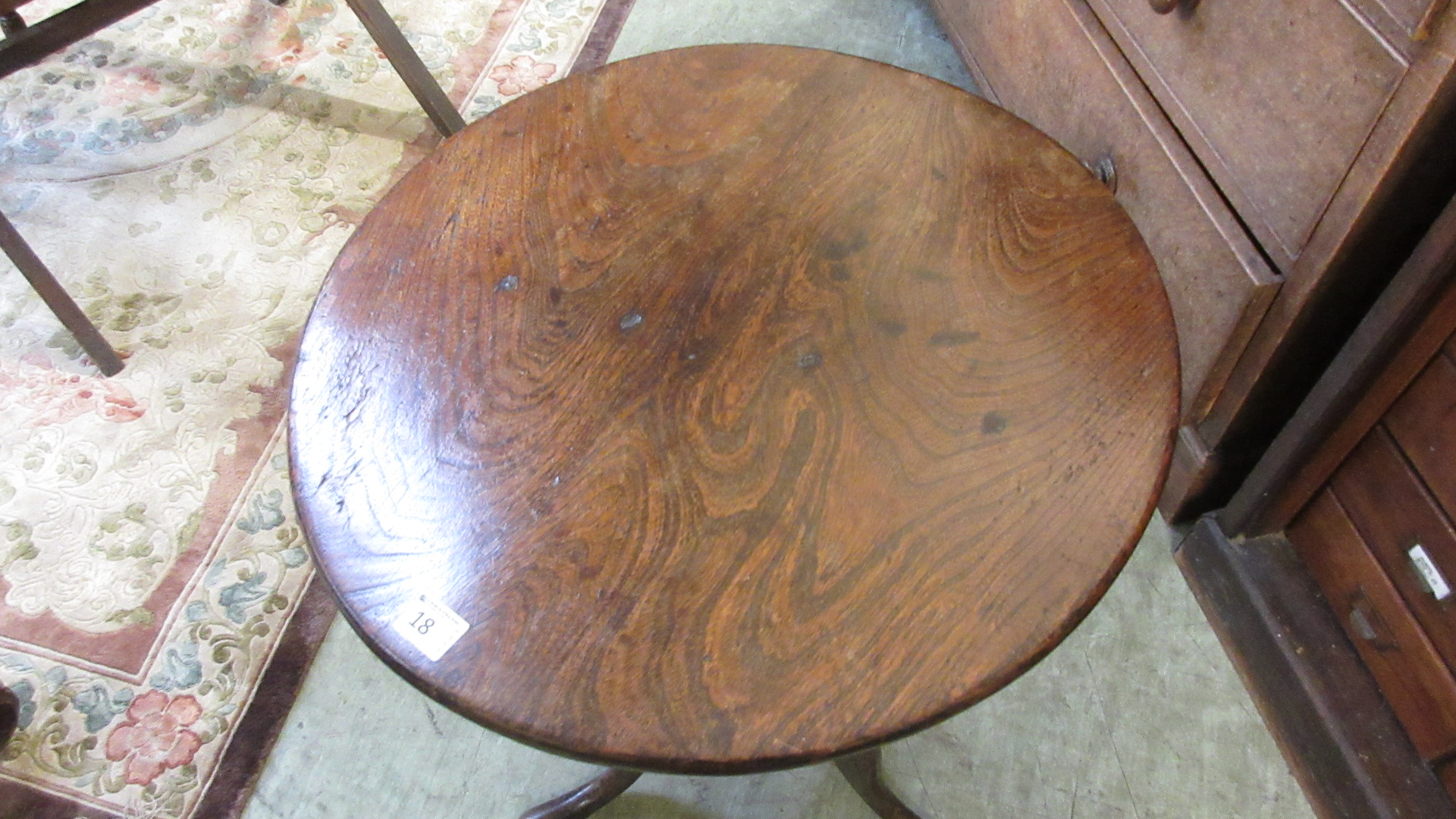 An 18th century oak and elm tripod table, the circular elm top on turned oak column. h. 69 cm, dia. - Image 2 of 3