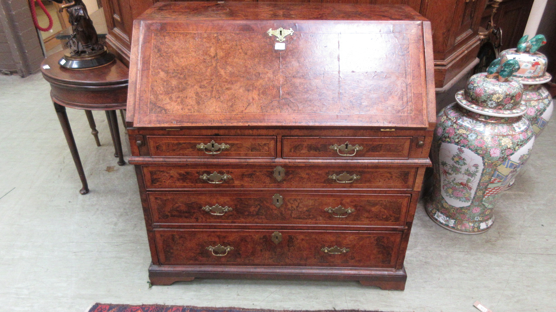 An early 18th century walnut herringbone line inlaid and crossbanded bureau, - Image 8 of 13