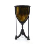 An Edwardian mahogany and brass lined plant stand,