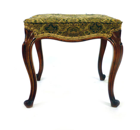 A Victorian walnut stool on carved cabriole legs with shell design to top. h. 44 cm, w. 48 cm, d.