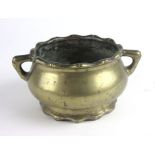 A Chinese brass twin handled censor bowl, with bamboo style and base,