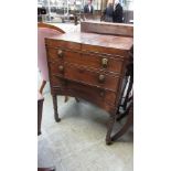 A Regency mahogany writing table, the fold out top revealing writing slope,