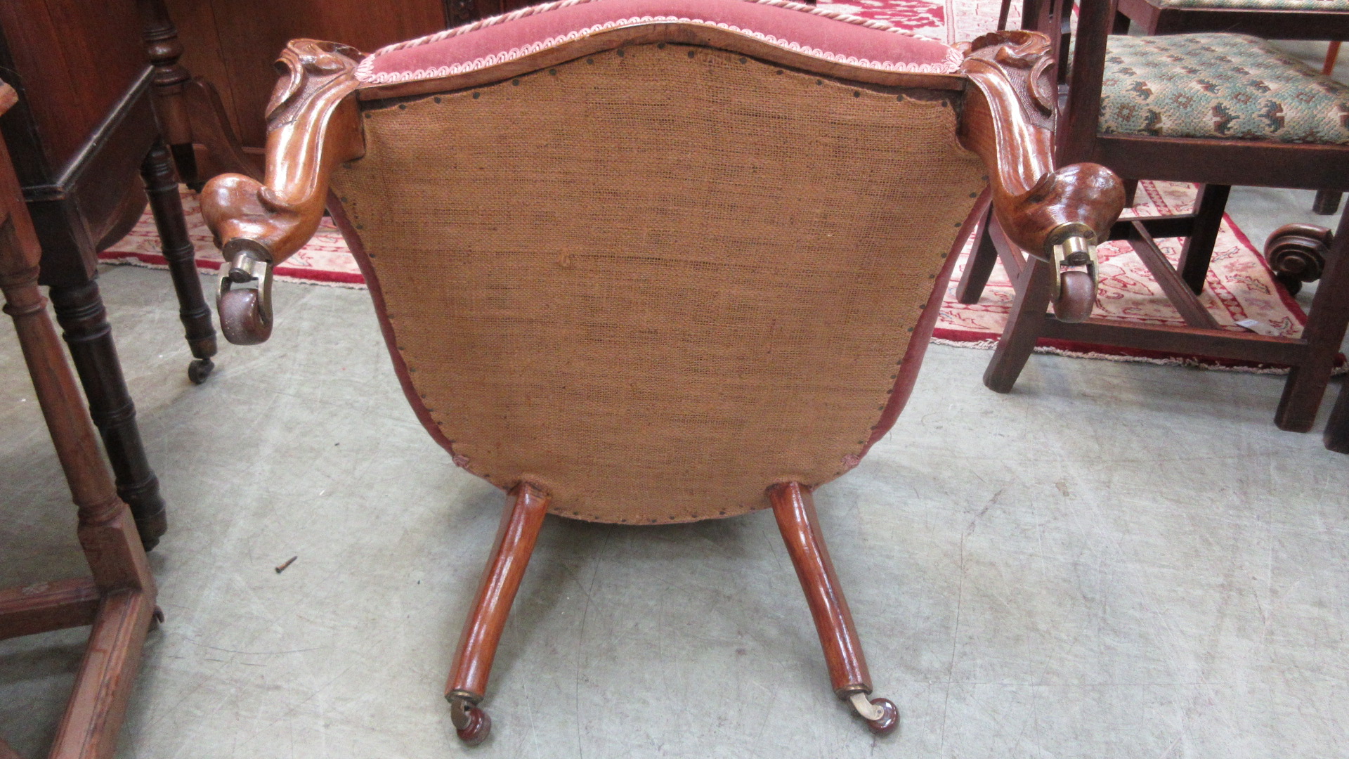 A Victorian walnut salon chair upholstered in a cut pink button backed fabric on carved cabriole - Image 5 of 5