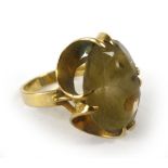 A 9ct yellow gold dress ring set seven oval citrine in a raised four claw setting, ring size L 1/2,