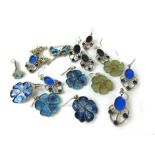 Seven pairs of silver and enamelled earrings of flowerhead and openwork design and two pendants,