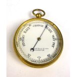 A brass cased pocket barometer, marked Casartelli & Son Manchester to face, d. 6.