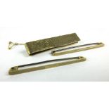 Three 9ct yellow god tie clips of varying designs, overall 7.