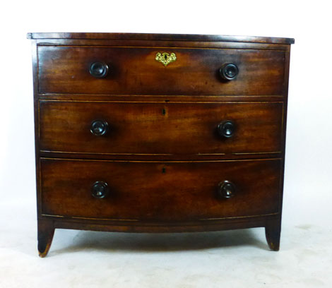 A Victorian mahogany bow front chest of drawers,