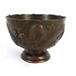 A Chinese bronzed dragon design censor bowl d. 14 cm h.