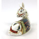 A cased Royal Crown Derby paperweight modelled as a donkey 'Thistle', with gold stopper, h. 11.