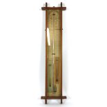 An early 20th century Admiral Fitzroy's oak cased barometer,