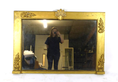 A Regency gilt framed over mantle mirror with applied flame design moulding and shell to top. h.