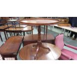 A late 18th century mahogany oval tilt top tripod table, the galleried,