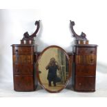 A Victorian mahogany dressing table the oval mirror over two banks of four bow fronted drawers