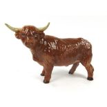 A figure modelled as a highland cow, in the manner of Beswick, h.