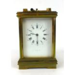 A brass cased five glass carriage clock/repeater striking on a gong,