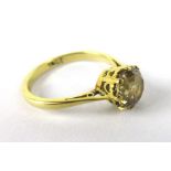 A 18ct yellow gold ring set brilliant cut citrine within an eight claw setting, ring size J 1/2, 2.