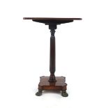 A regency and later mahogany tilt top occasional table, the rectangular top on reeded column,
