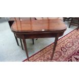 A late 18th century mahogany, boxwood line inlaid and crossbanded tea table,