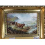 James Skerrett (formerly of Royal Worcester), a study of cows in a highland setting, signed,