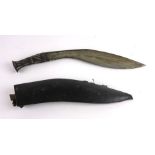 A mid 20th century Kukri knife, with cast metal handle,