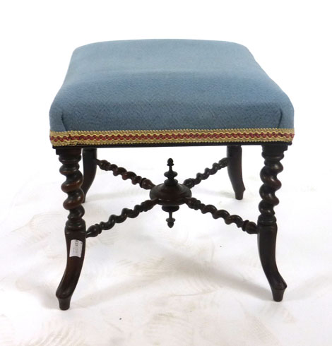 A Victorian mahogany stool with barley twist legs and stretchers, upholstered in blue fabric. h.