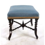 A Victorian mahogany stool with barley twist legs and stretchers, upholstered in blue fabric. h.