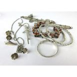 A mixed parcel of silver and metalware jewellery including two twist bangles,