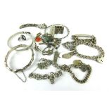 A mixed group of silver and metalware jewellery including a bamboo design bracelet,