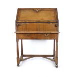 An early 18th century cedar wood bureau on stand,