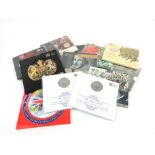 A group of thirteen uncirculated coin sets including The Battle of Waterloo £5,