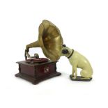 A mid 20th century "His Masters Voice" gramophone player with brass trumpet along with a plastic