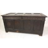 An 18th century oak coffer,