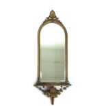 A early 19th century gilt wood rococo style mirror,