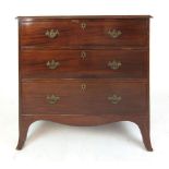 An early 19th century mahogany chest of three graduated drawers on splay feet, h. 92 cm, w.