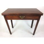 A late 18th century mahogany tea table,