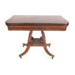 An early 19th century rosewood and brass mounted card table,