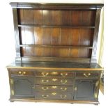 An 18th century and later oak dresser,